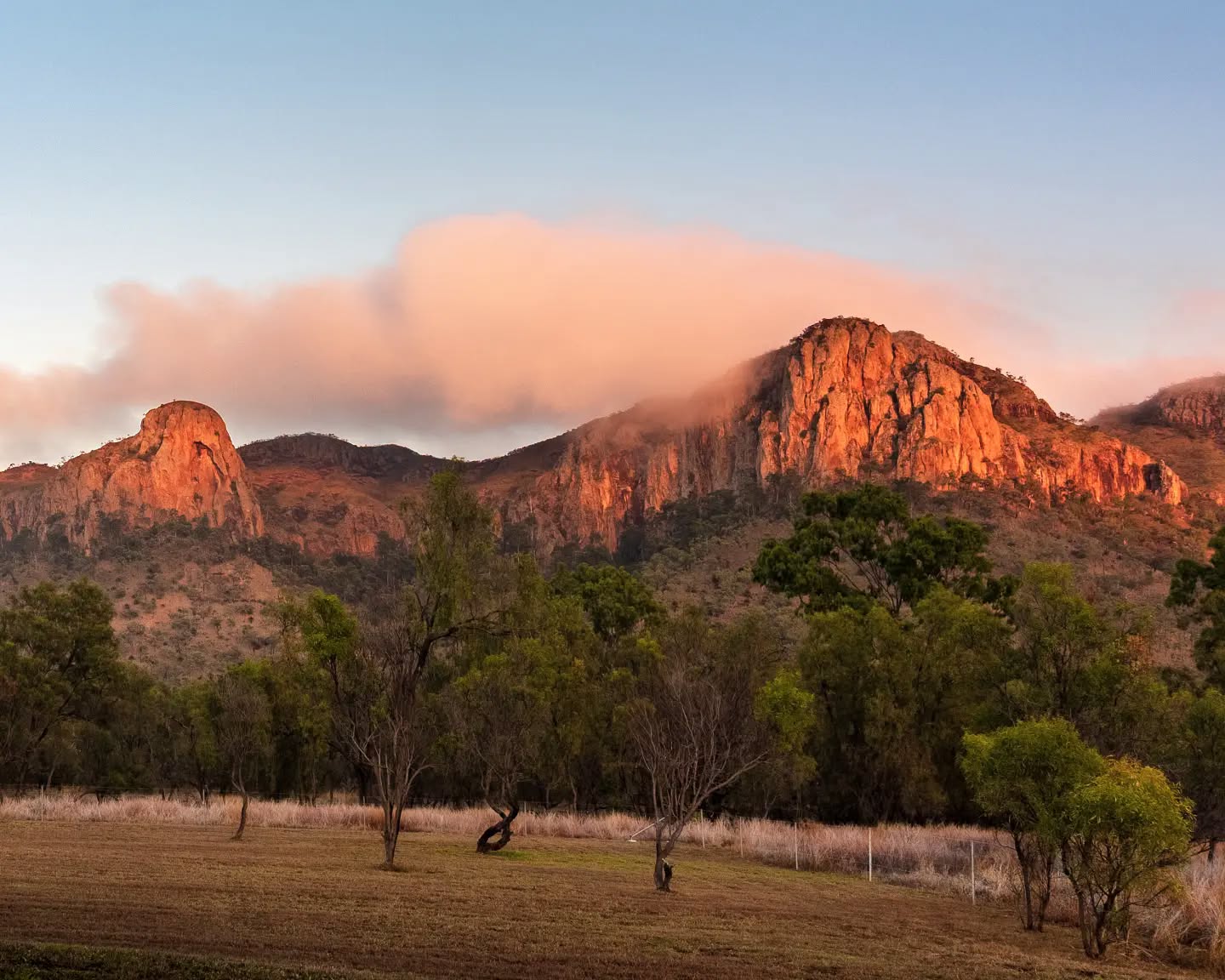 Sunlit sandstone ranges at dawn